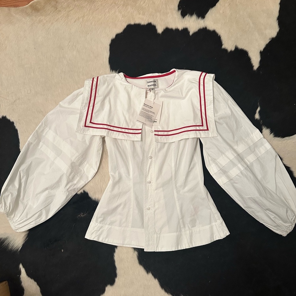 White Blouse with Red Trim